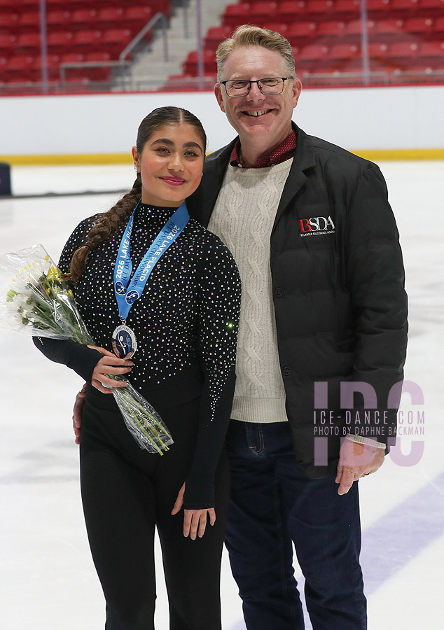 Amal Israilova and coach Steven Belanger