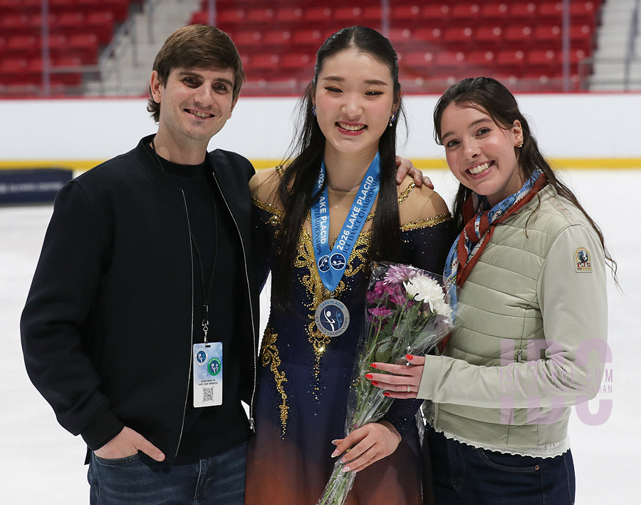 Alison Rho with coaches Pierre Souquet and Lorraine McNamara